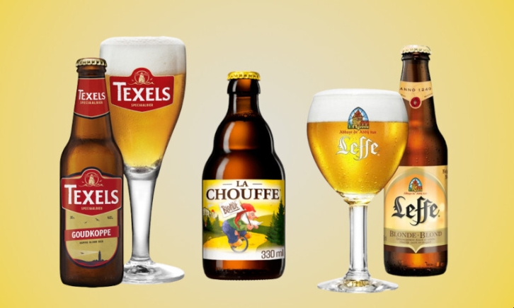 Drie blonde bieren naast elkaar